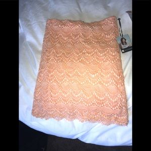 Crochet patterned pink skirt